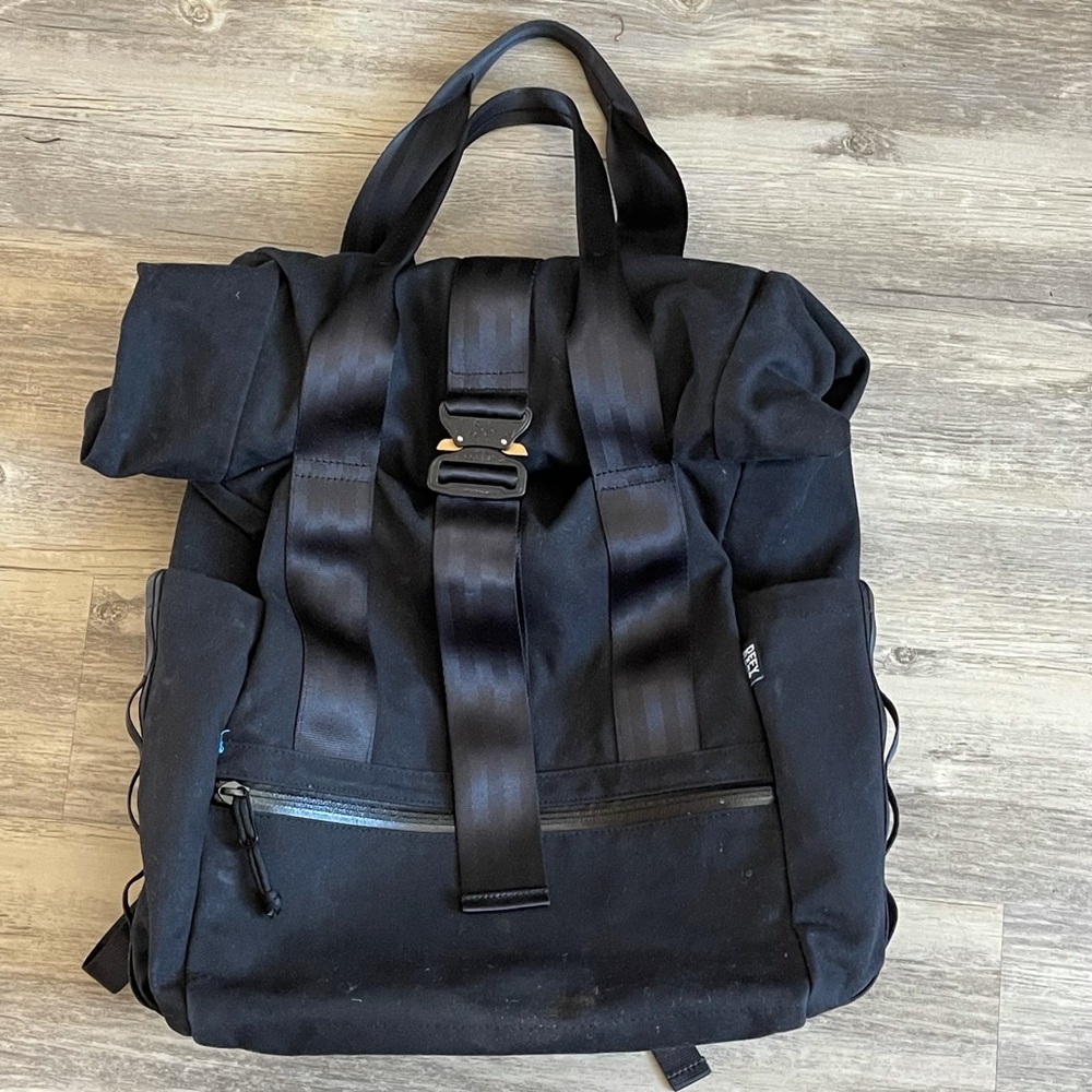DEFY VERBOCKEL ROLLTOP BACKPACK 2.0 UN-ZIPPED BLACK WAX CANVAS